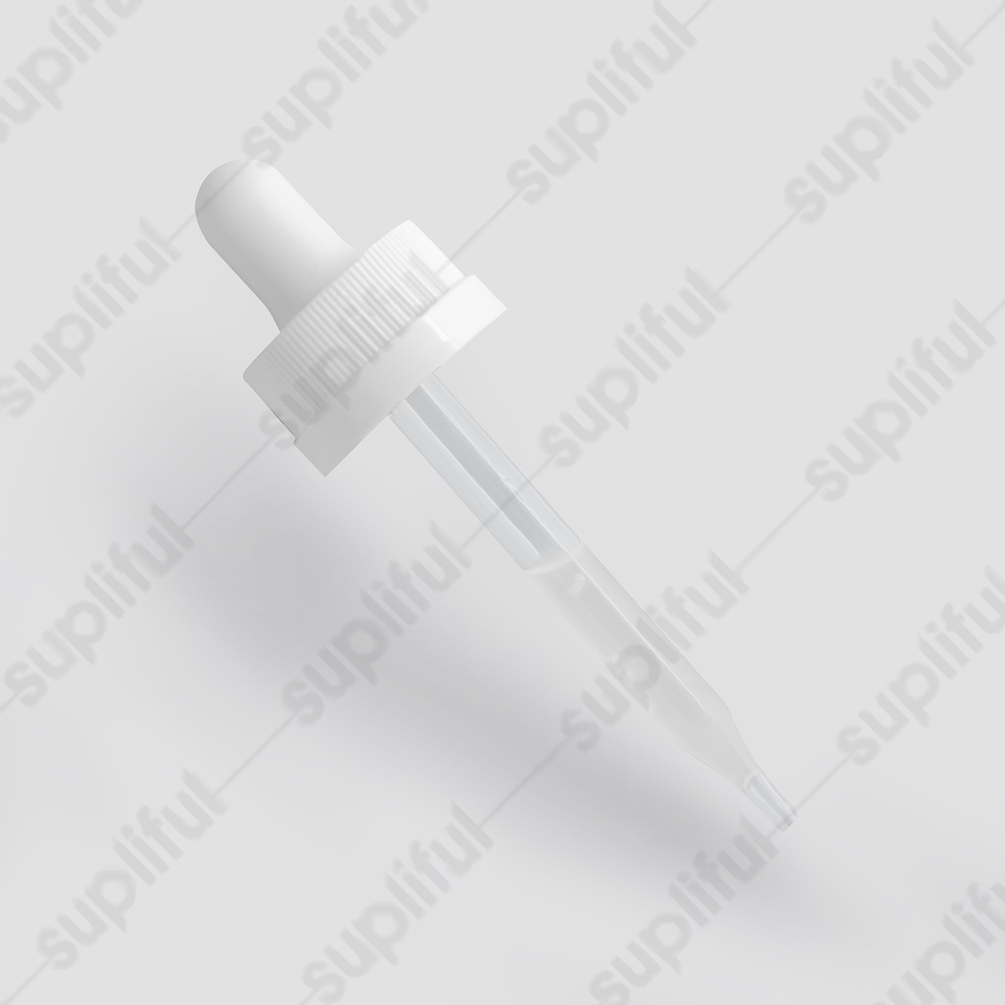 White dropper with clear pipette on a light background, skincare product packaging